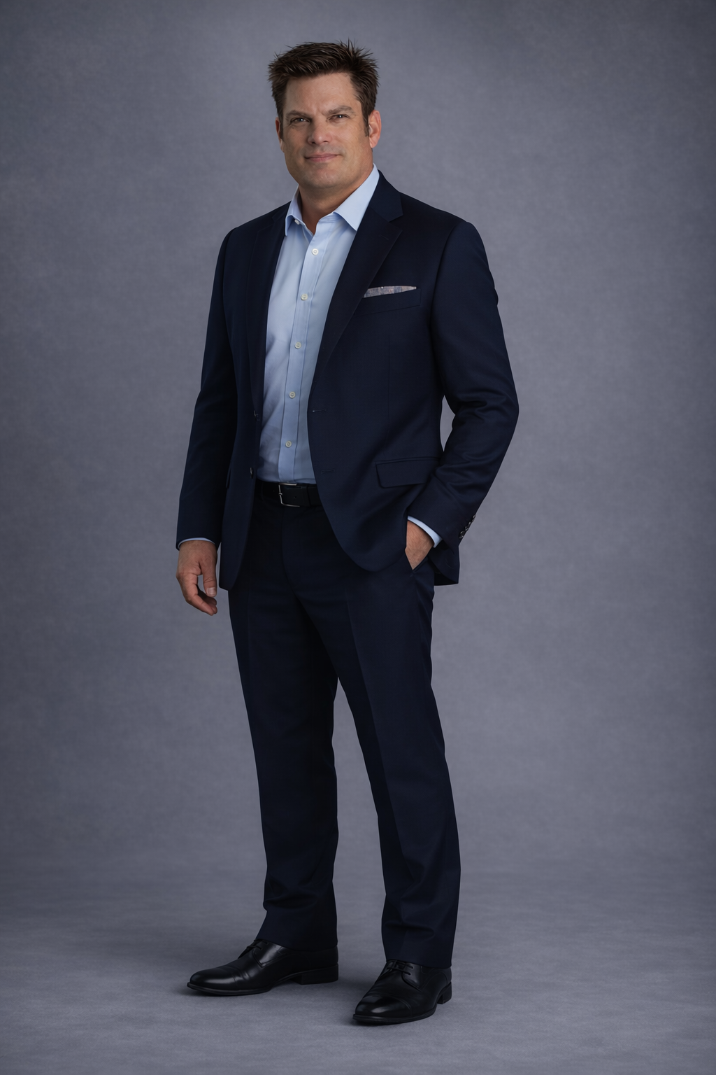 Dan McKim in a navy blazer